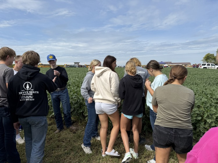 Students at the soybean field