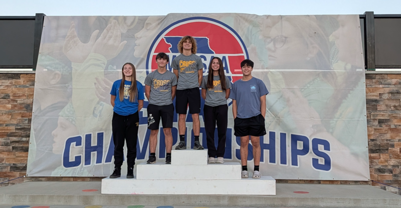 Team on the medal stand before the meet at State