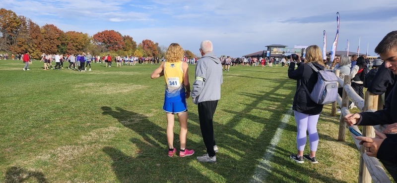 Carter and Coach discuss strategy before the race starts