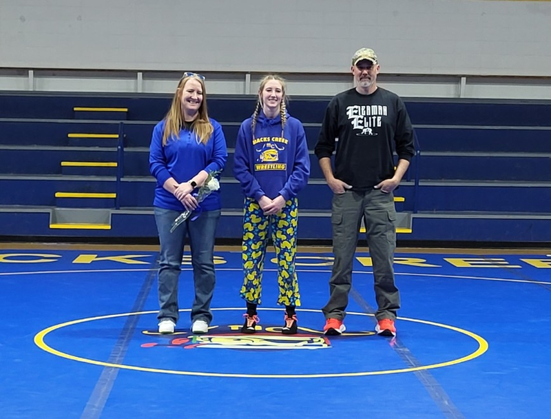 Kamora with Mom and Dad