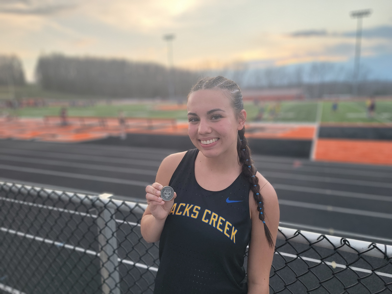 Izzy shows off her medal