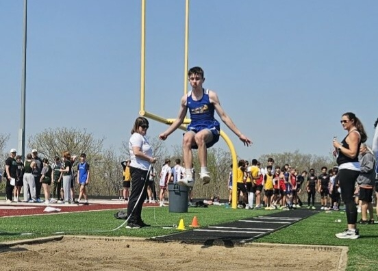 Chase Gould long jumps 