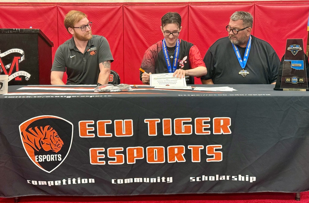 Senior student Jasson Harris Green signing letter of intent