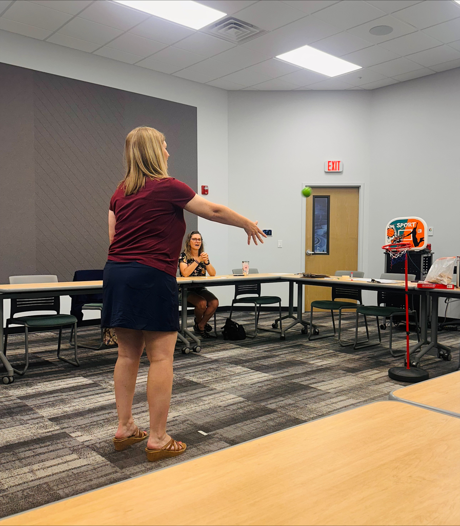 Educators interacting in classroom games during professional development
