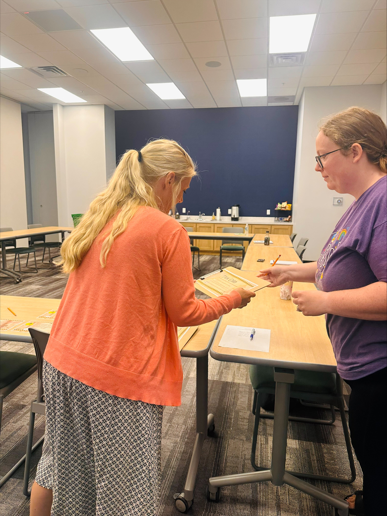 Educators interacting in classroom games during professional development