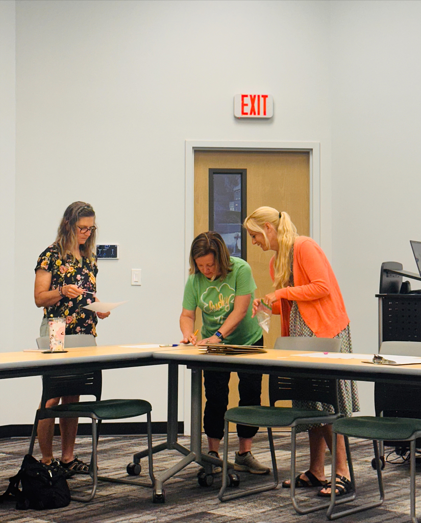 Educators interacting in classroom games during professional development