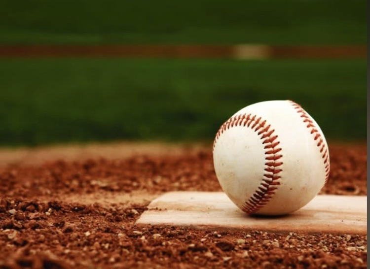 baseball sitting on pitching rubber
