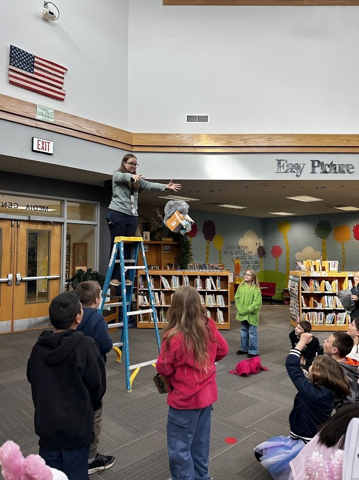 Mrs. Norton dropping an egg.