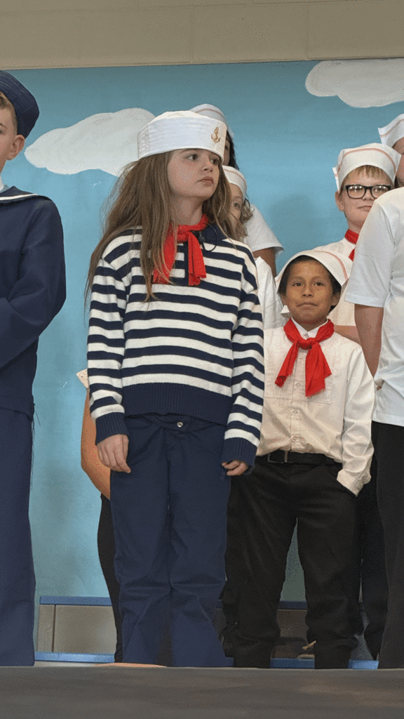 Cast member saying lines in musical.