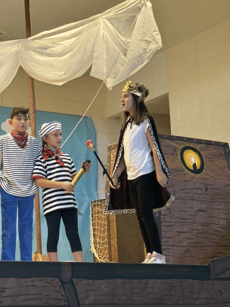 Jester and other students in Friday musical. 