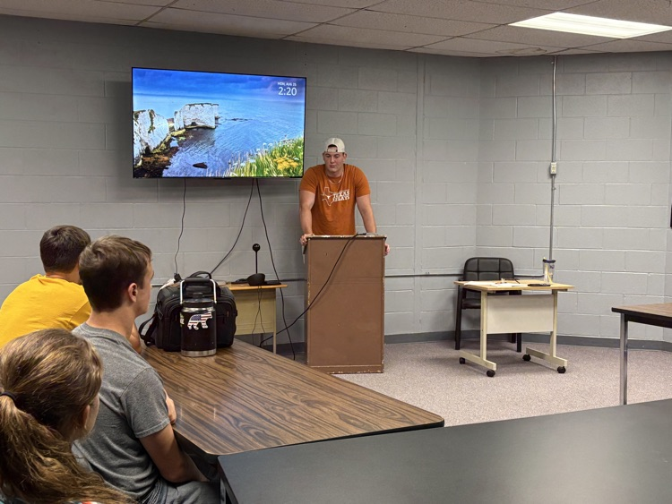 Casey Helm visits with college and career’s class