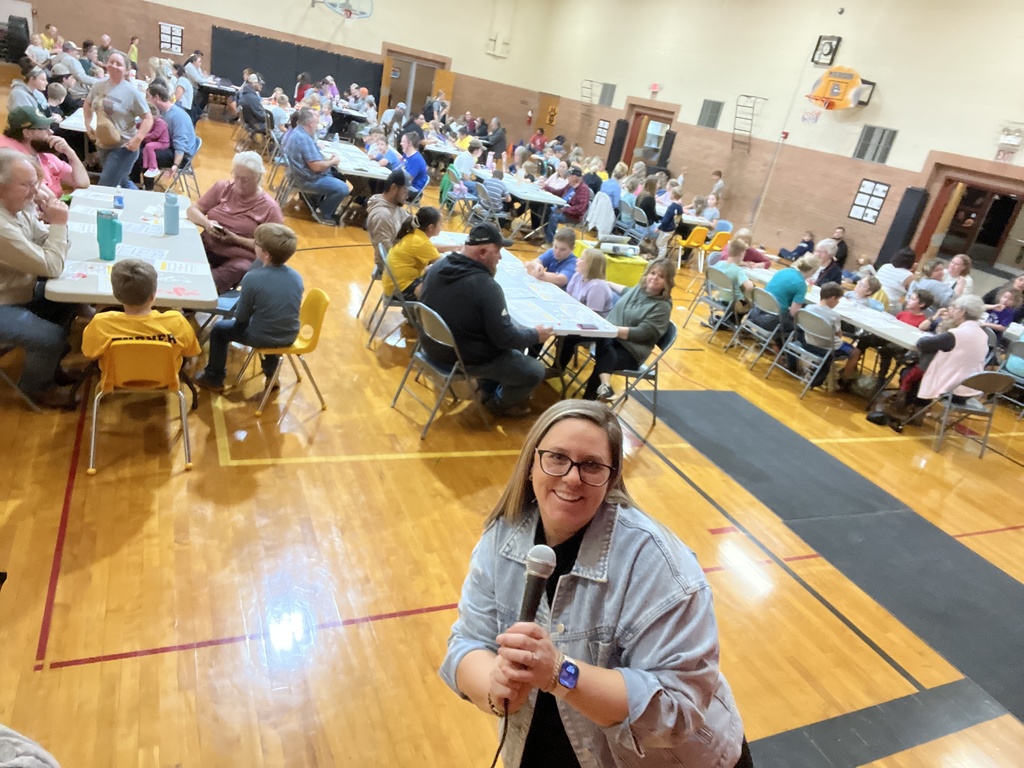 Mrs. Kusmaul calling BINGO numbers