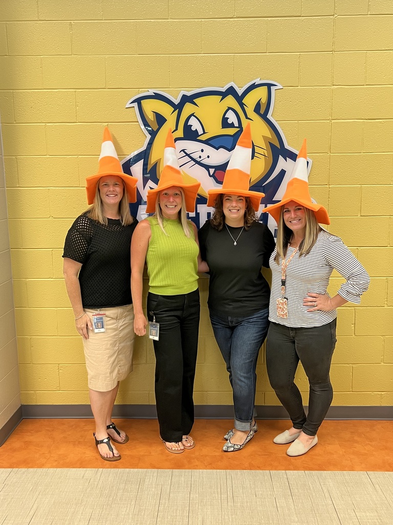Teachers with cone hats
