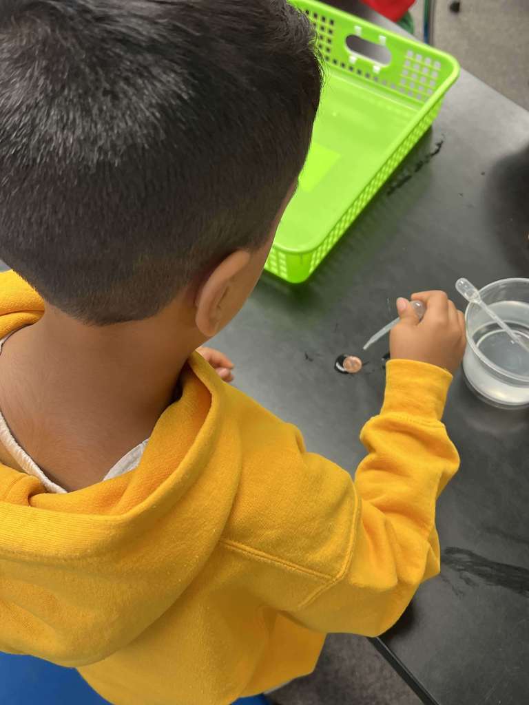 Students using science tools