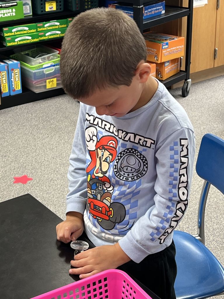 Students using science tools