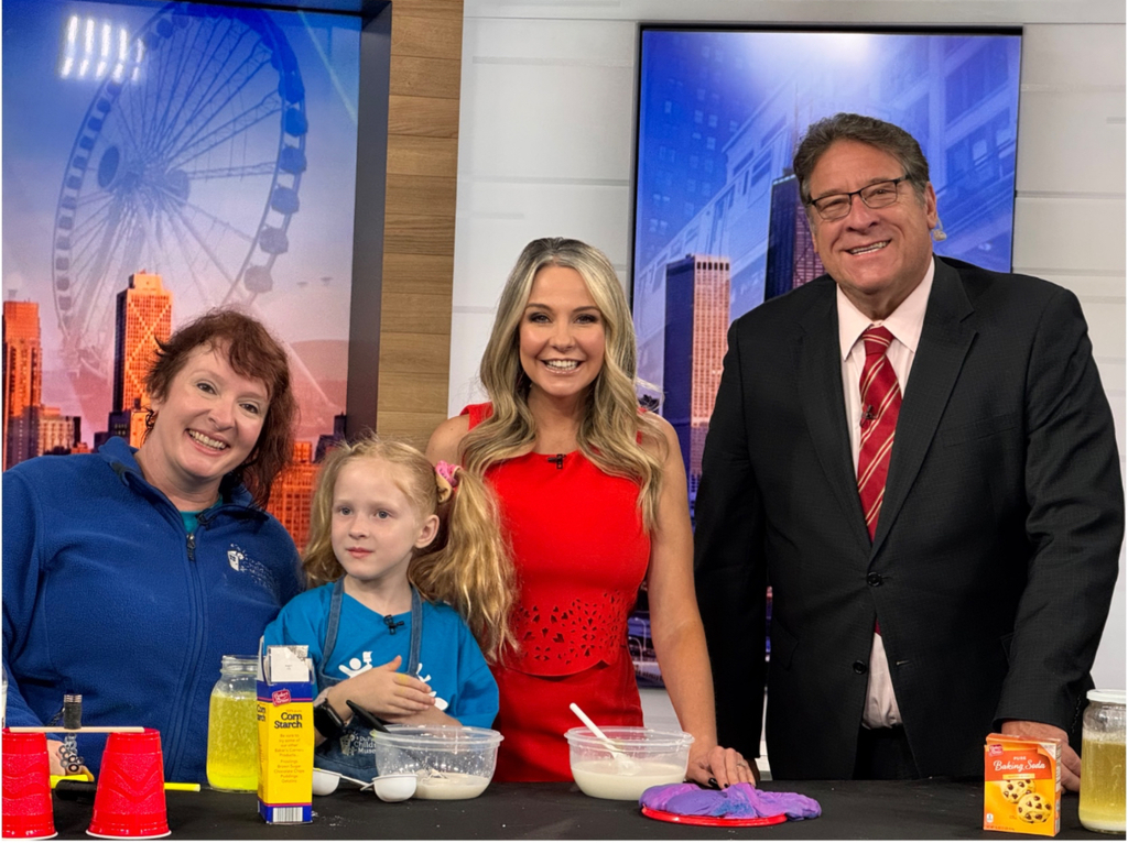 Mom and child on TV news set