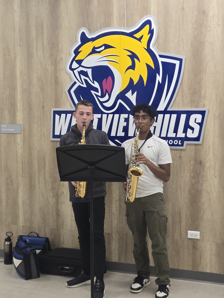 Students playing saxophones 