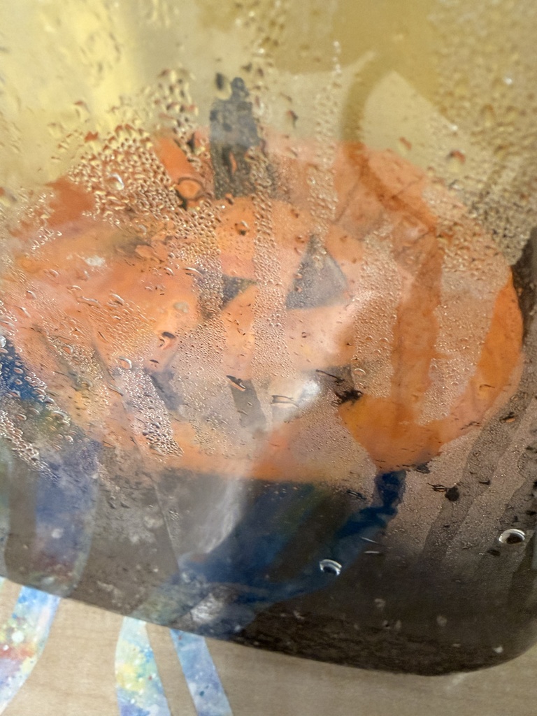 There is a lot of condensation in the container after several weeks and the pumpkin is looking flatter