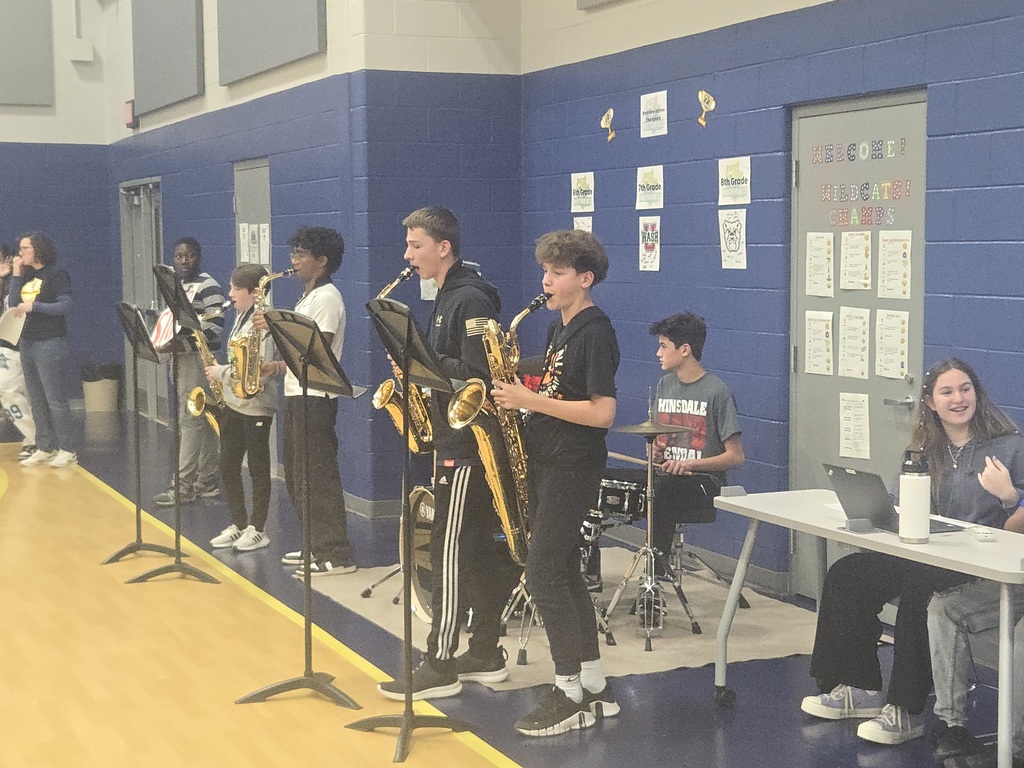 The band plays during the assembly in the gym