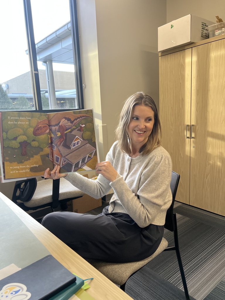 Teacher reading a book