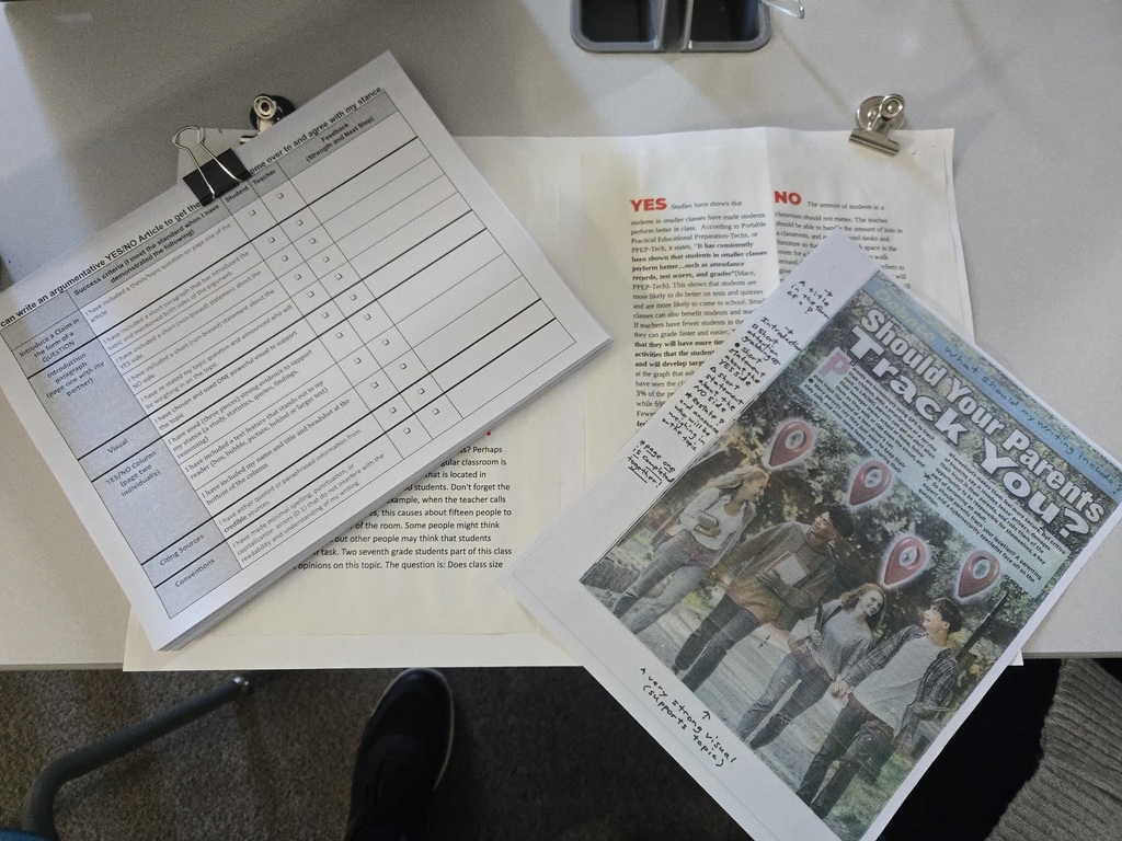 A photo of papers that show ELA grading