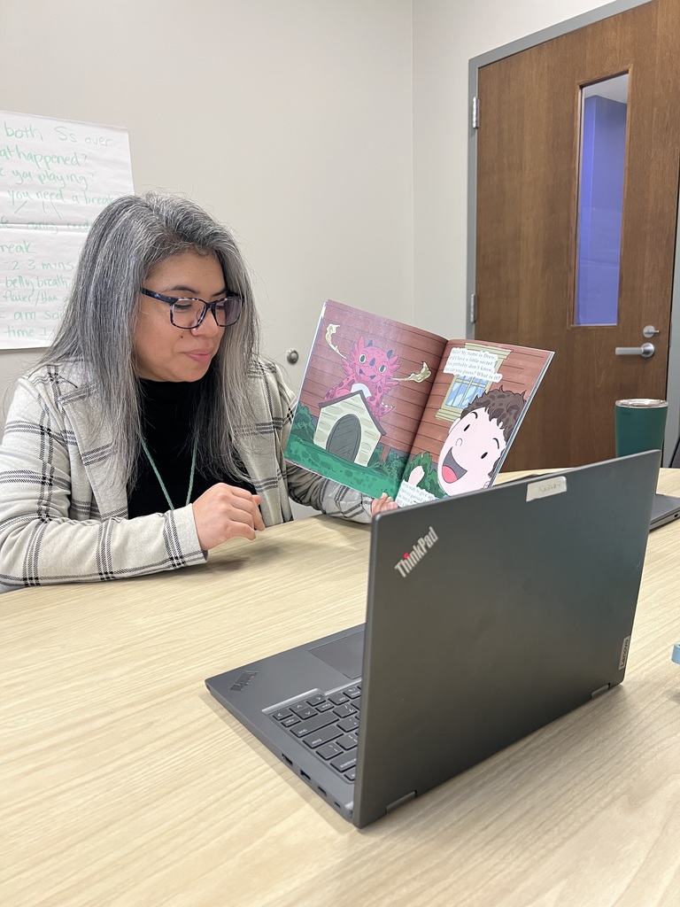 Teacher reading book