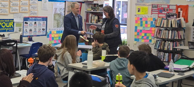 Westview Hills Middle School teacher Sondra LaPointe shaking hands with U.S. Congressman Sean Casten