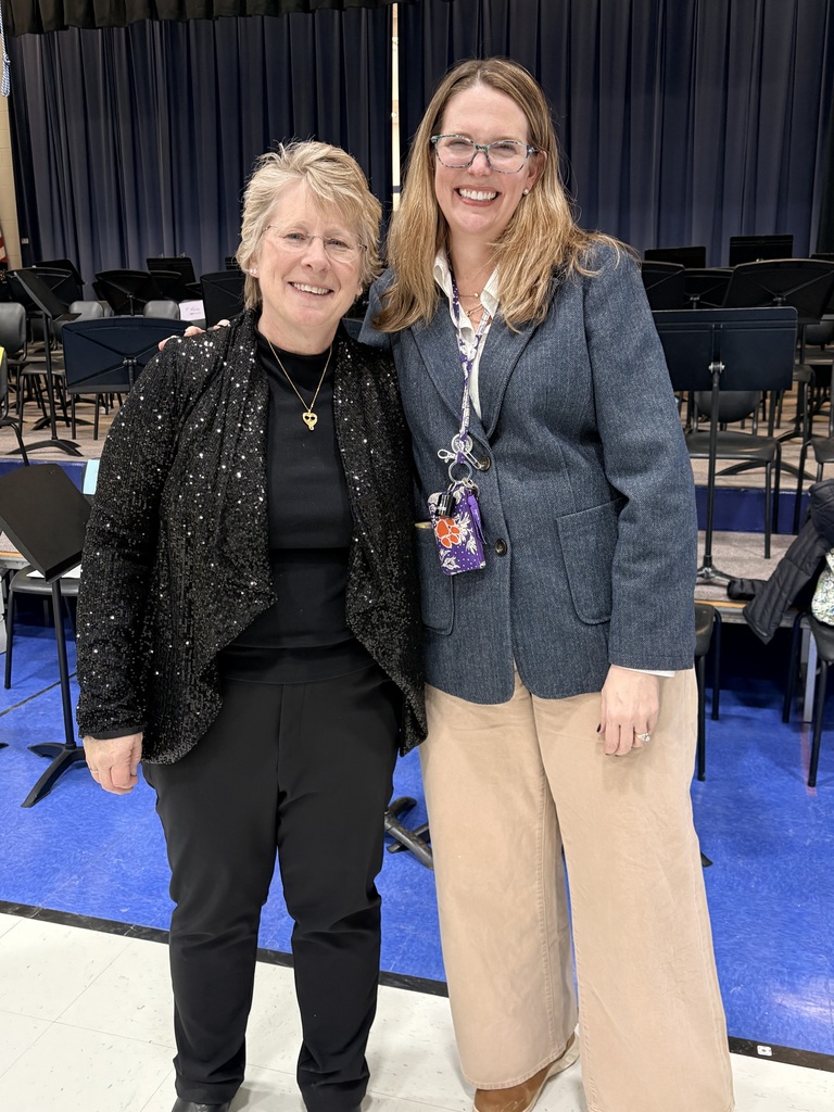 Mrs. Casey smiling at the camera 