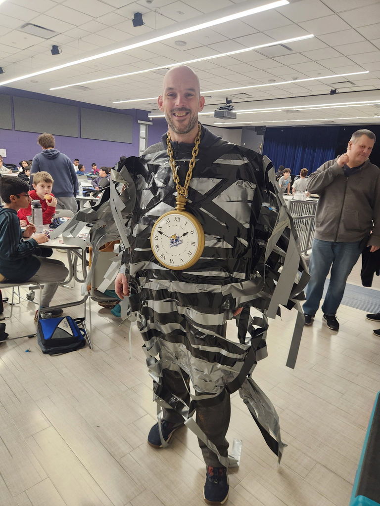 Principal duct taped to the wall