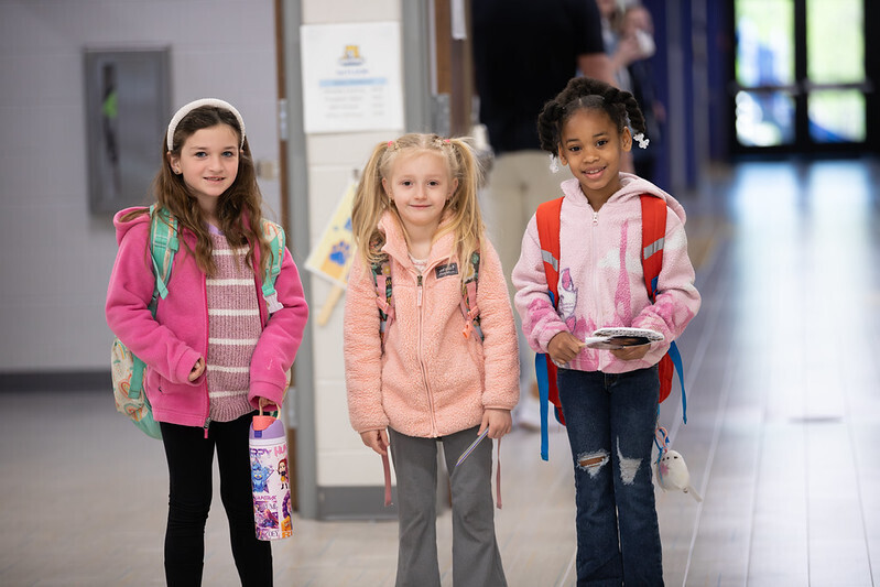Holmes students pose together in the hallway