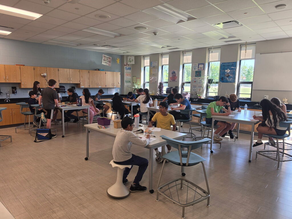 Students writing letters