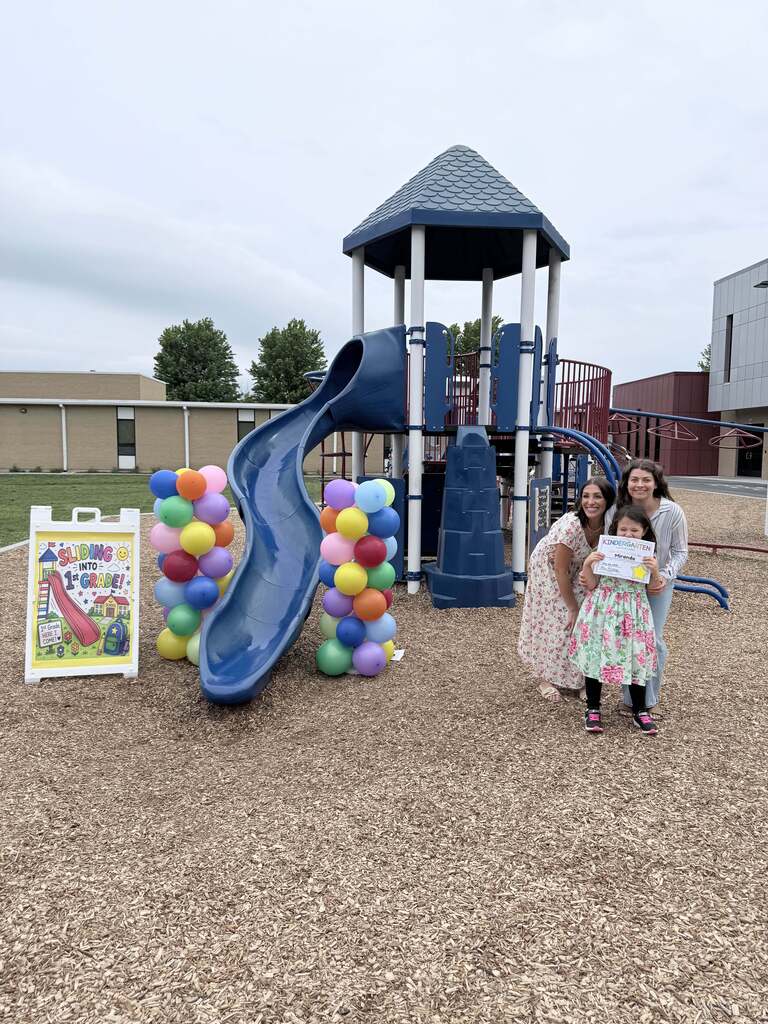A kindergartener "slides into first grade"