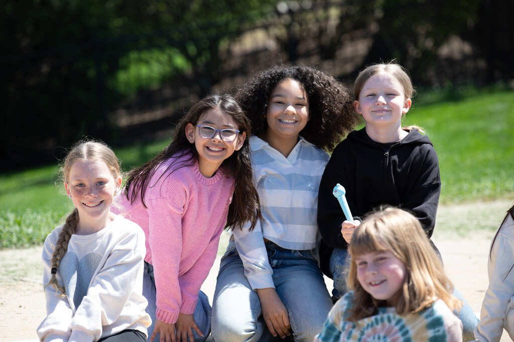Maercker students smile together outside