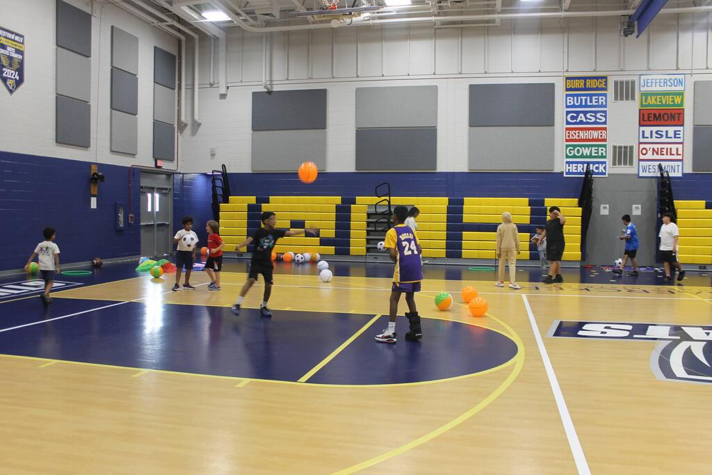 Students play a game in the gym