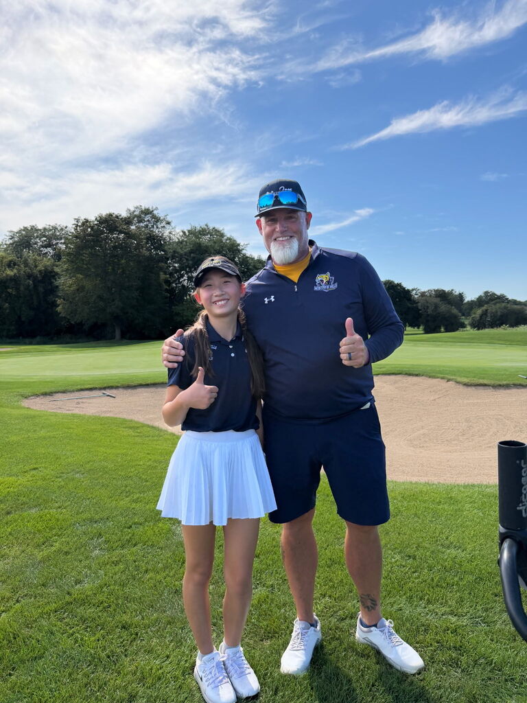 Golfer and coach