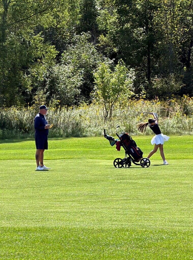 Golfer and coach