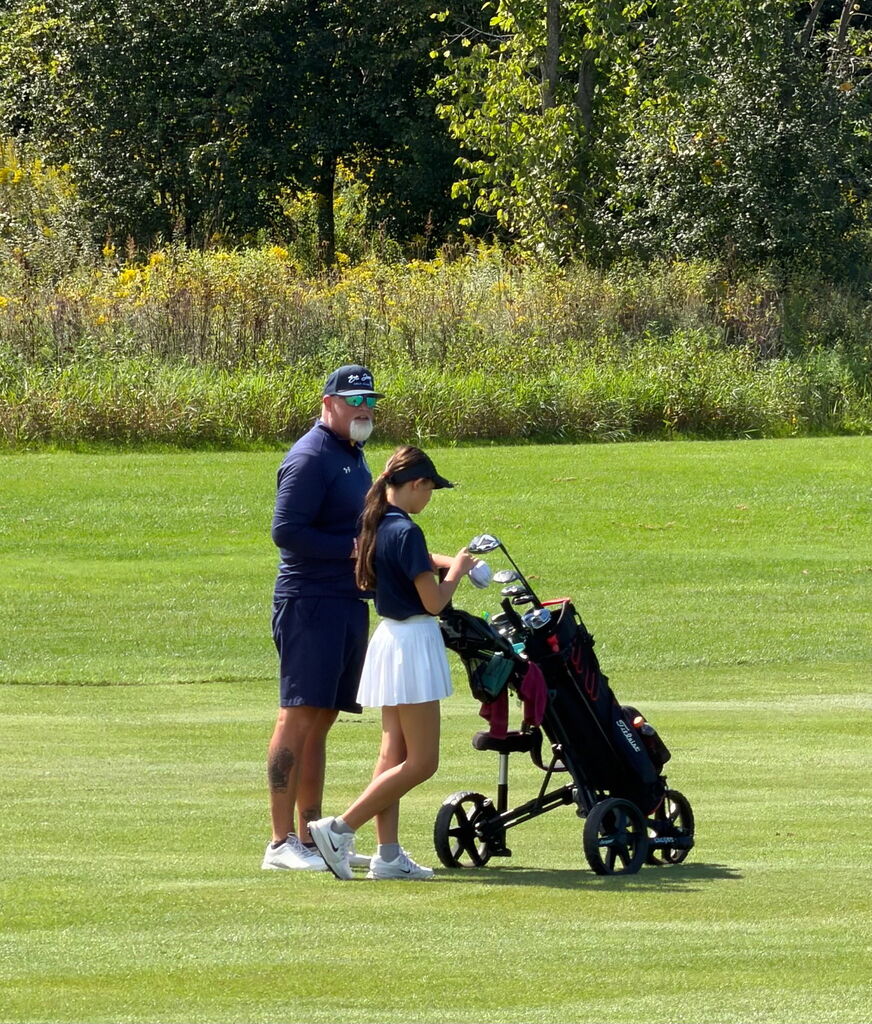 Golfer and coach