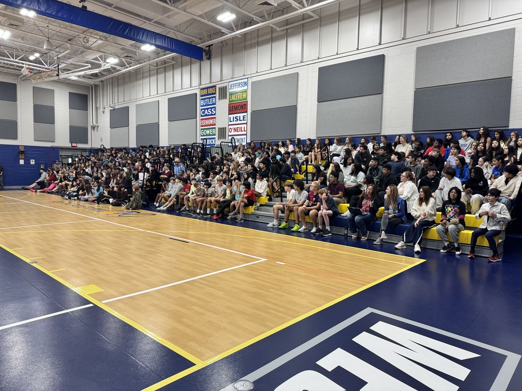 Students sit in the bleachers of the gym at Westview