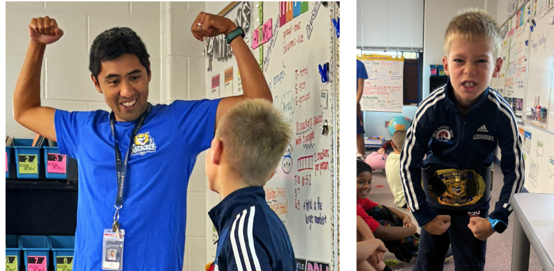 Mr. Bolus passing on the Attendance Belt to the third grade champs