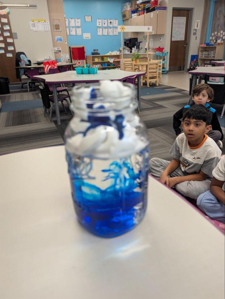 student watching science experiement