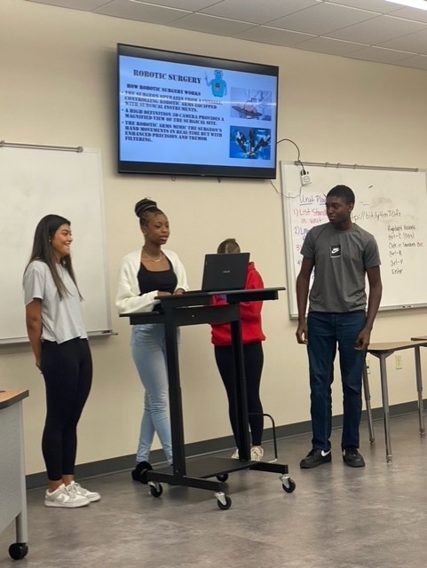 Coach Johnson's 1st & 2nd periods present to their classes. 