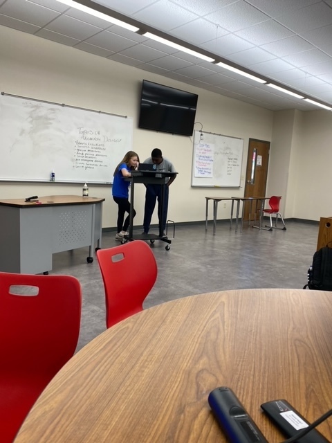 Coach Johnson's 1st & 2nd periods present to their classes. 