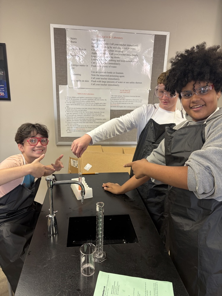 Students showing resulting DNA from extraction