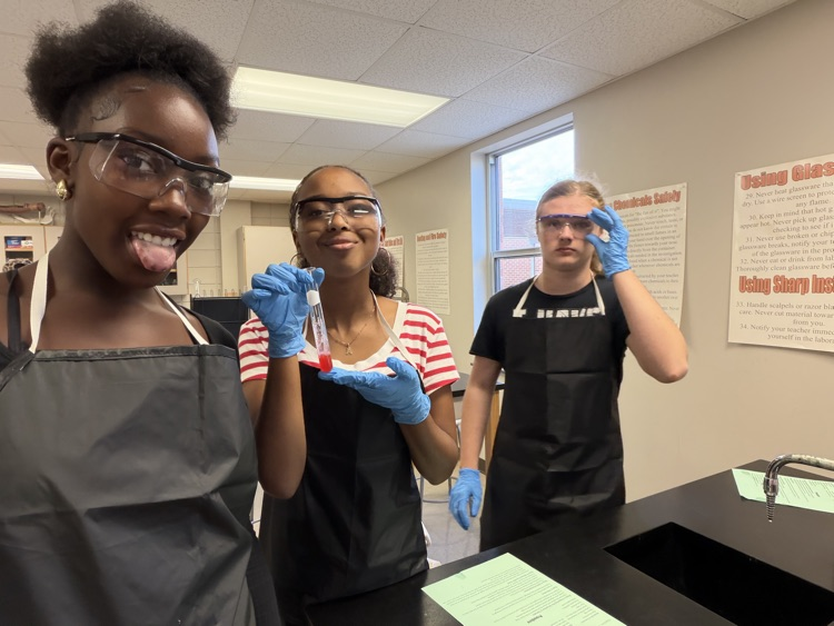 Students showing resulting DNA from extraction