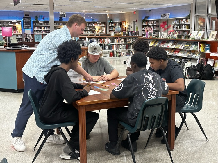 10th grade English students enjoy hands-on station activities.
