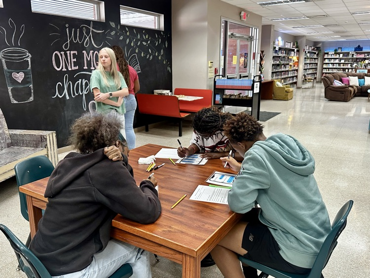 10th grade English students enjoy hands-on station activities.