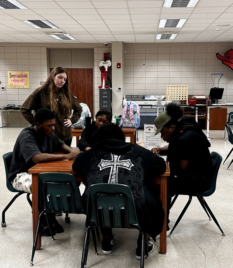 10th grade English students enjoy hands-on station activities.