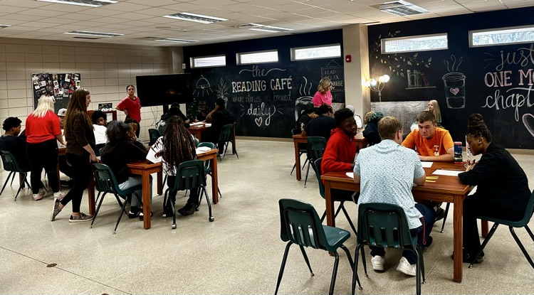 10th grade English students enjoy hands-on station activities.