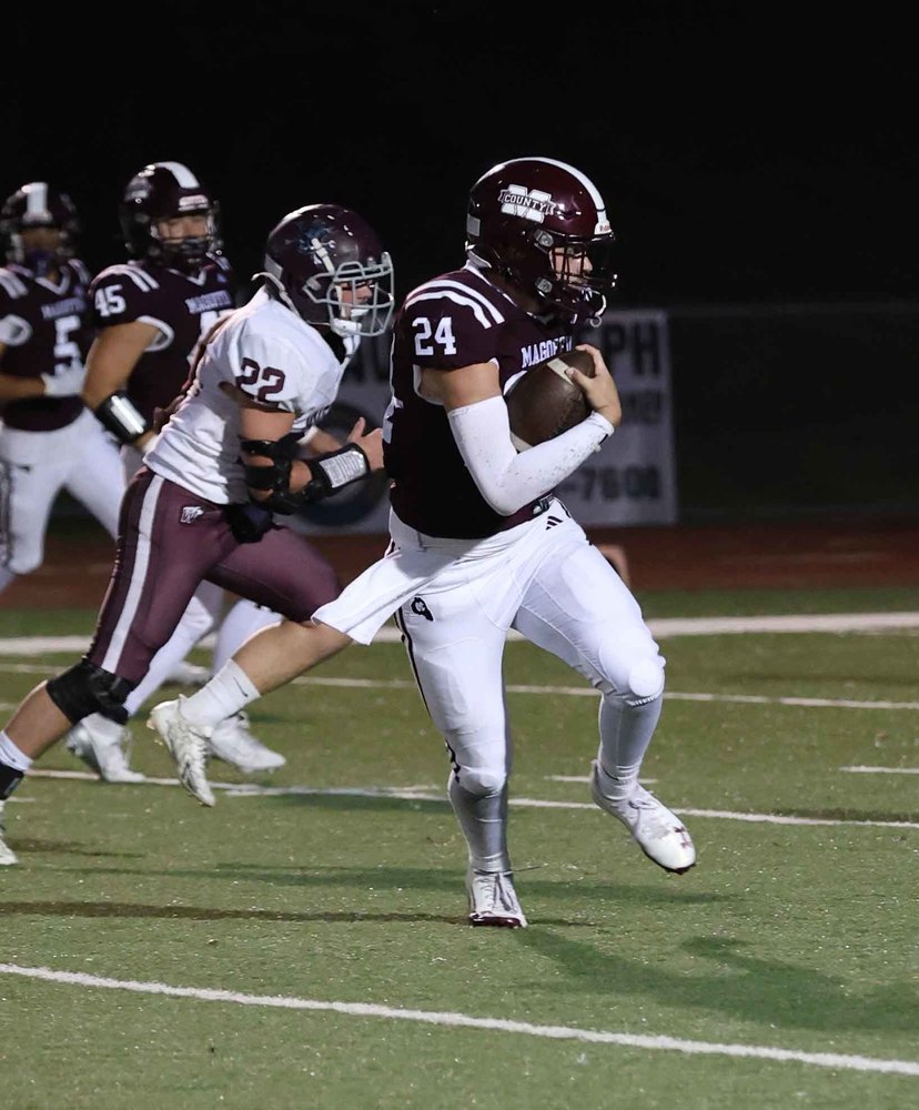 Jackson Gilliland picked up rushing yardage for Magoffin County during a game versus West Carter on Friday, Sept. 12.  Photo || Jim Arnett
