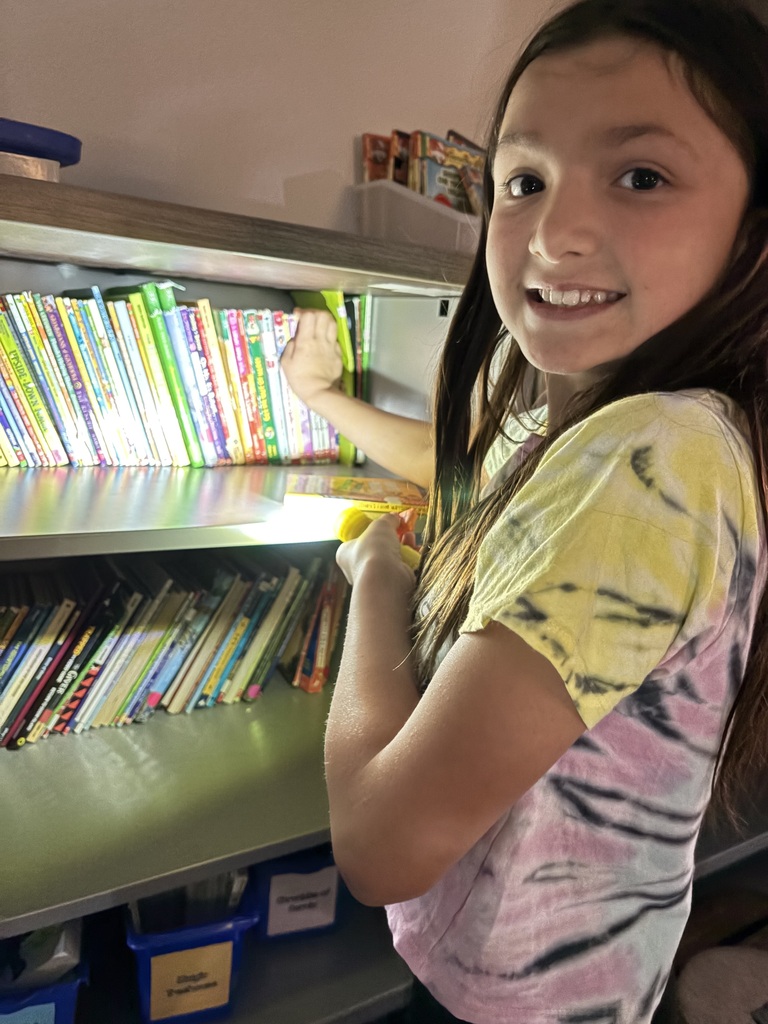 Students reading in the dark